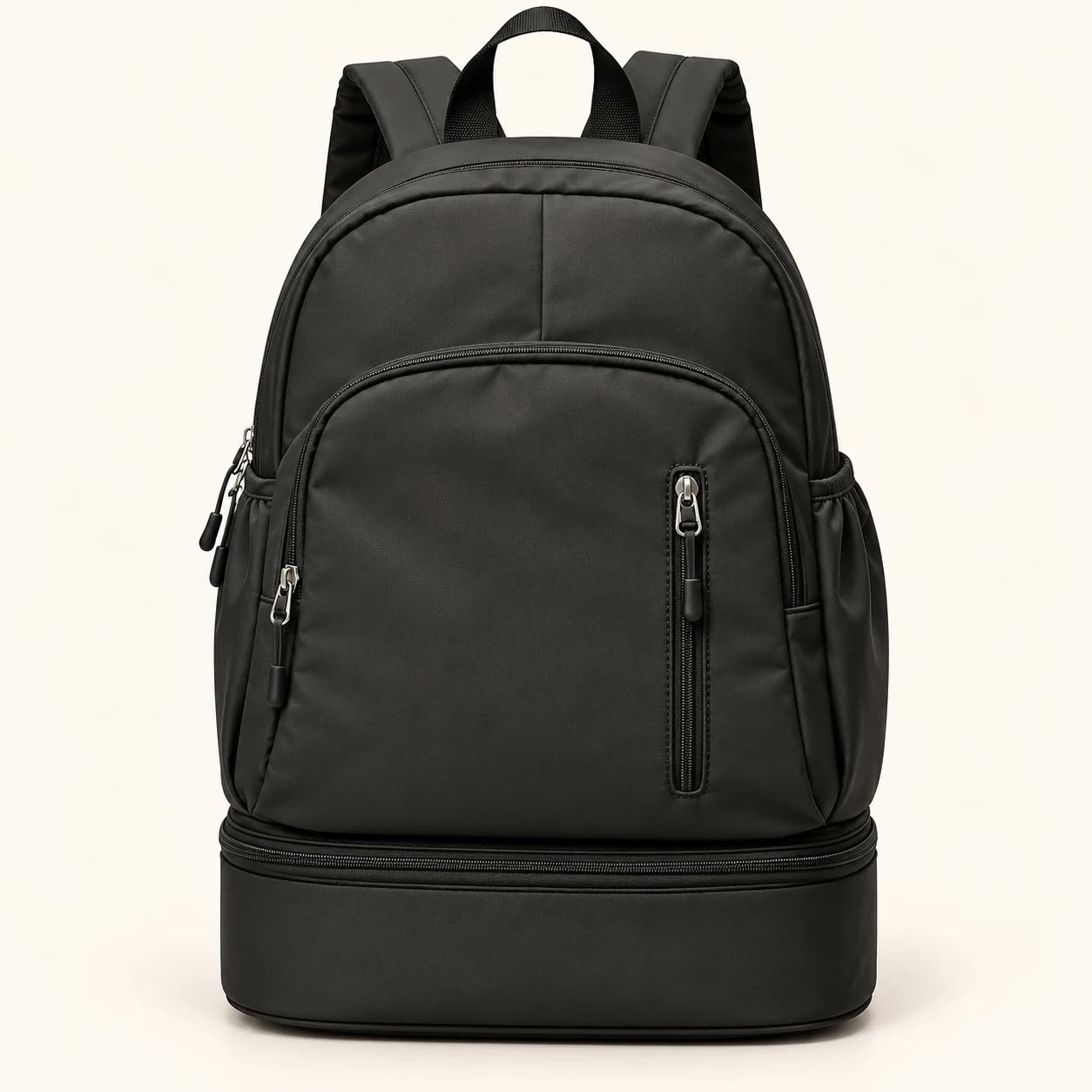 The black Everyday Backpack from the front, zipped closed.